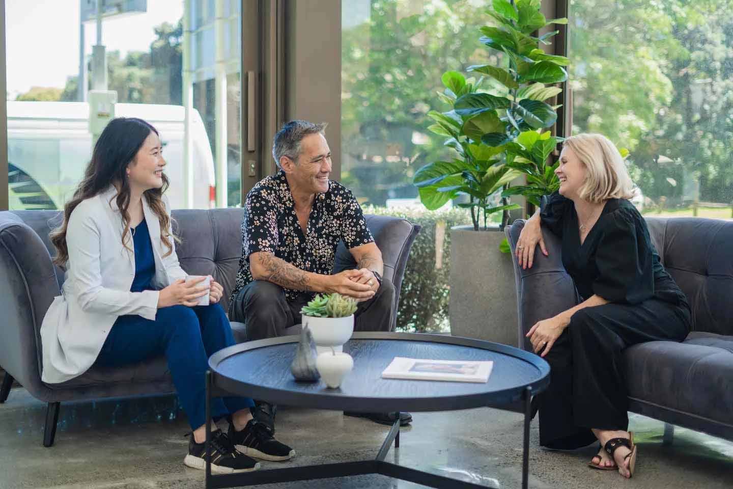 Hair restoration team consulting treatment planning and transplant support